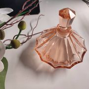 Vintage Art Deco perfume bottle in beautiful pink glass.