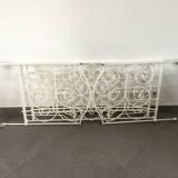 White wrought iron folding bed