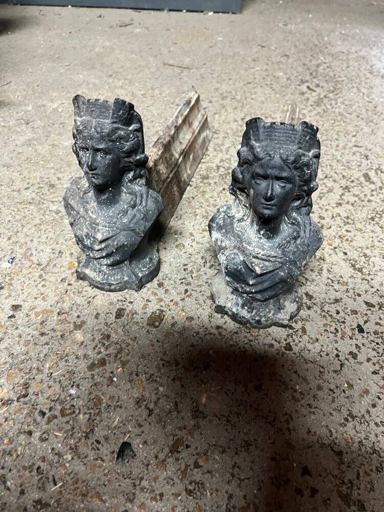 Pair of cast iron fire dogs from the 19th century