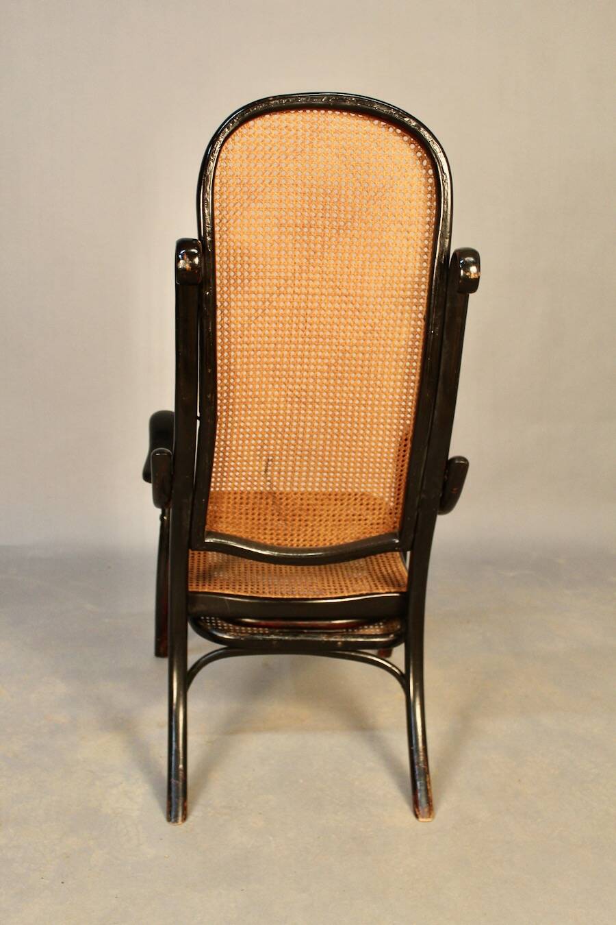 Bentwood cane armchair with mechanism and footrest