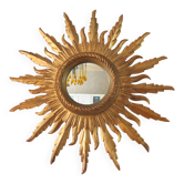 Miroir soleil en bois doré sculpté, années 50