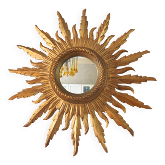 Sun mirror in carved gilded wood from the 1950s