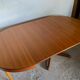 Table ronde dia 116cm extensible type Scandinave en teck et placage de teck an 1960