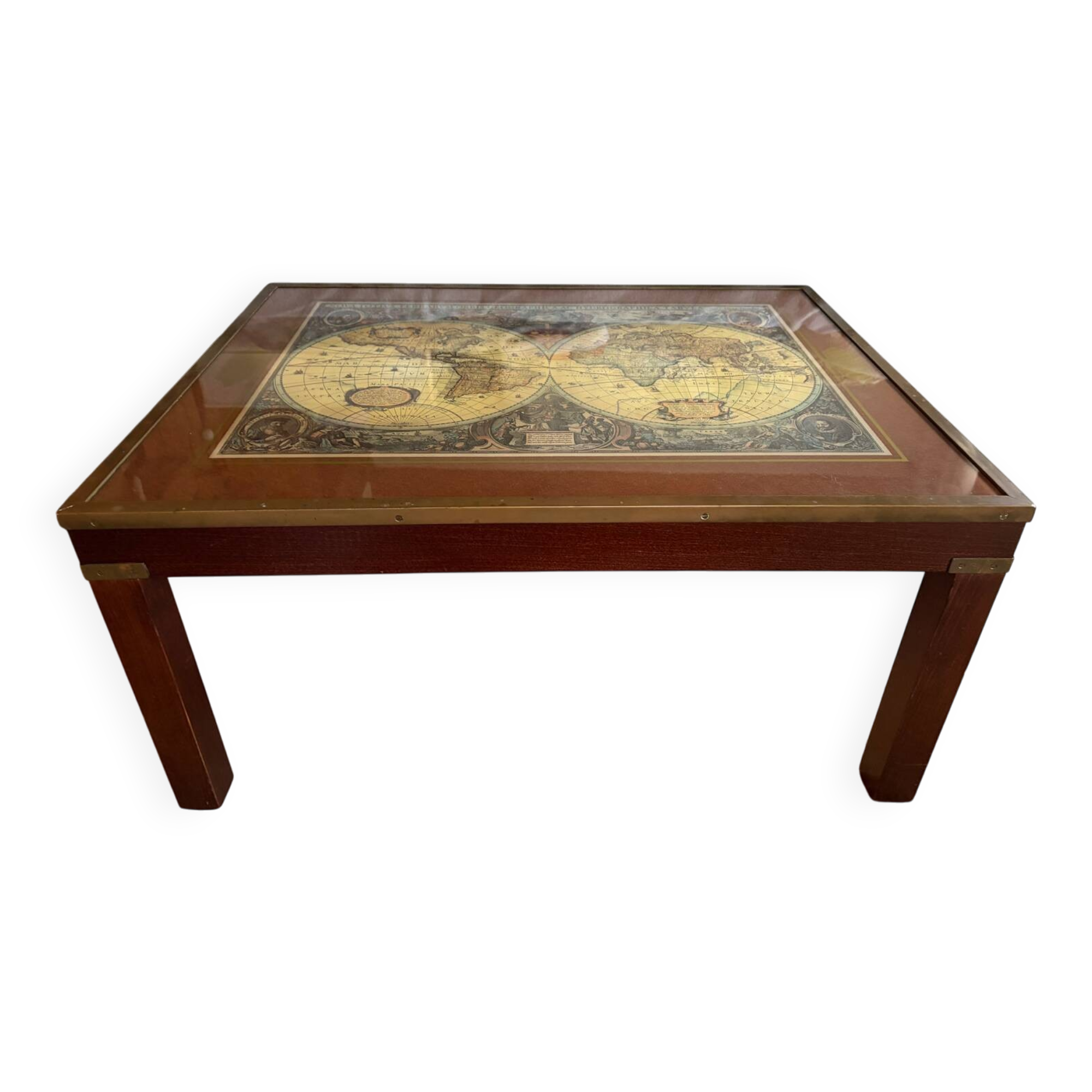 Wood and brass coffee table with a world map under glass.