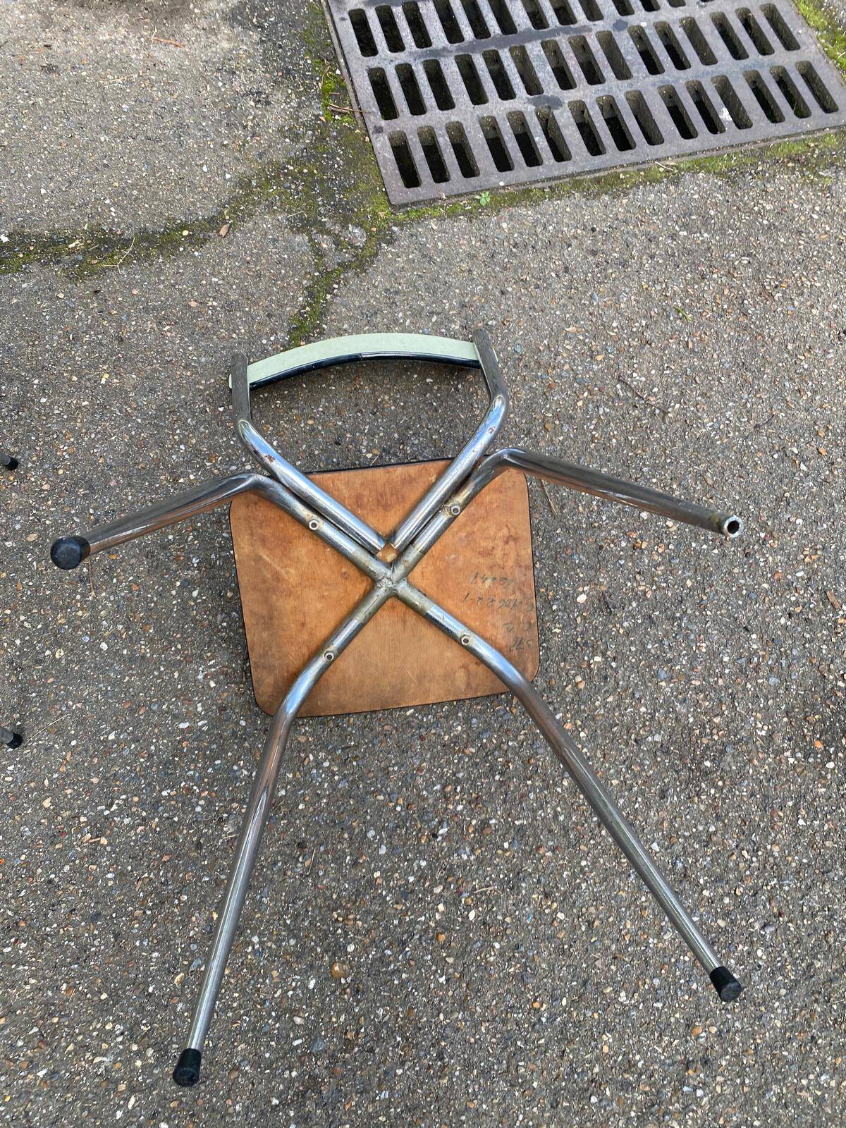 2 light green Formica and steel chairs from the 1980s.