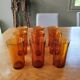 Lot de 9 gobelets hauts vintage en verre ambre