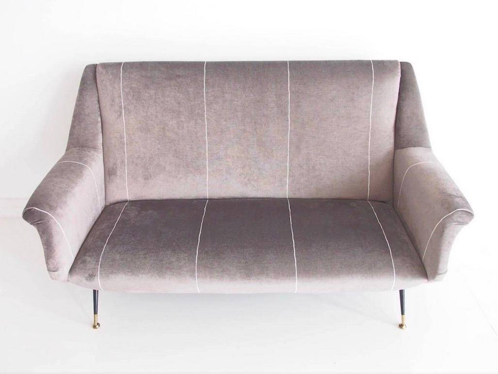 Italian velvet sofa in grey with black lacquered brass legs.