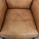 Beautiful subtle vintage sheepskin armchair with elegant legs