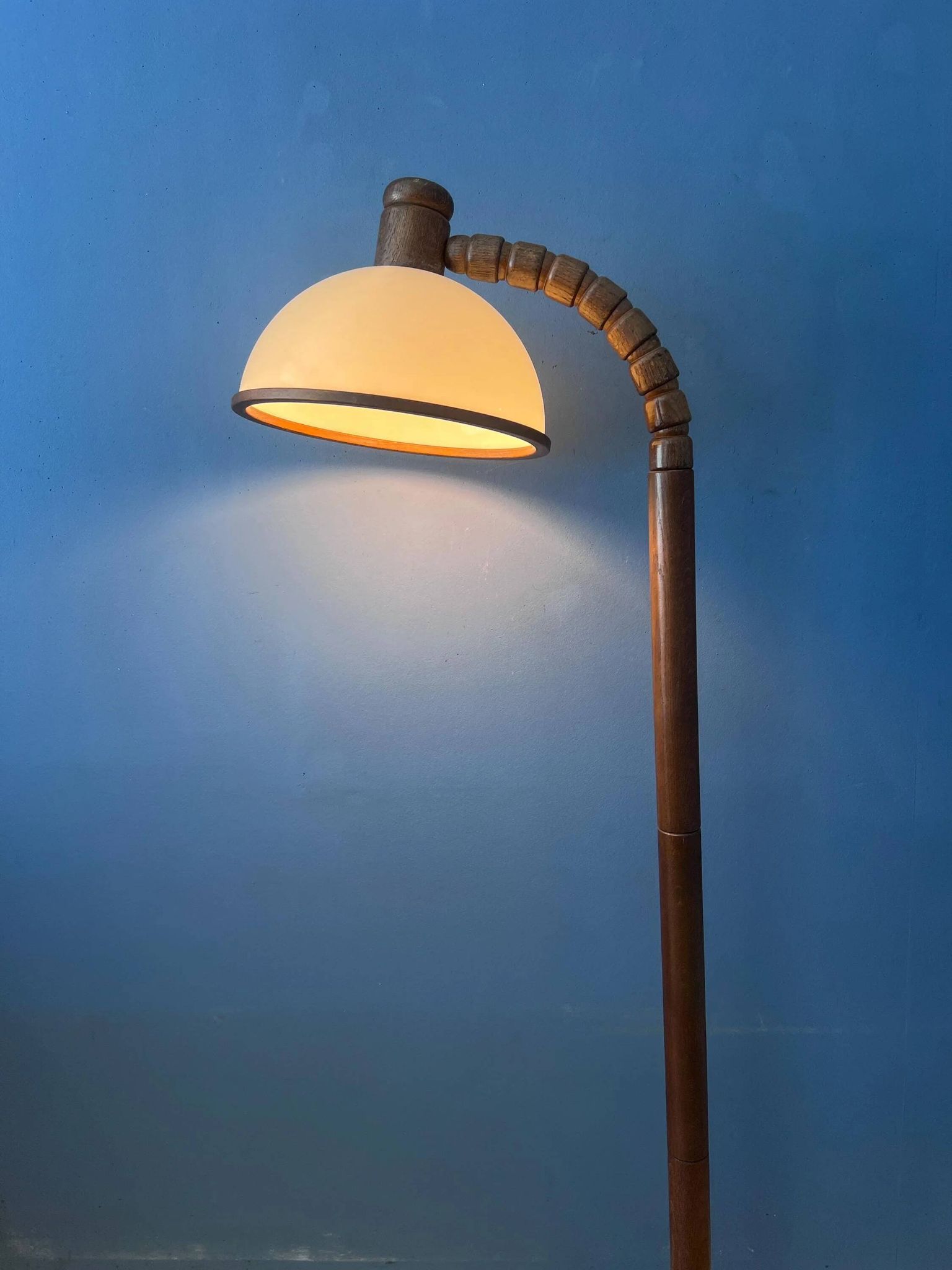 Mid-century floor lamp in brown wood by Steinhauer with an acrylic glass shade.