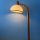 Mid-century floor lamp in brown wood by Steinhauer with an acrylic glass shade.