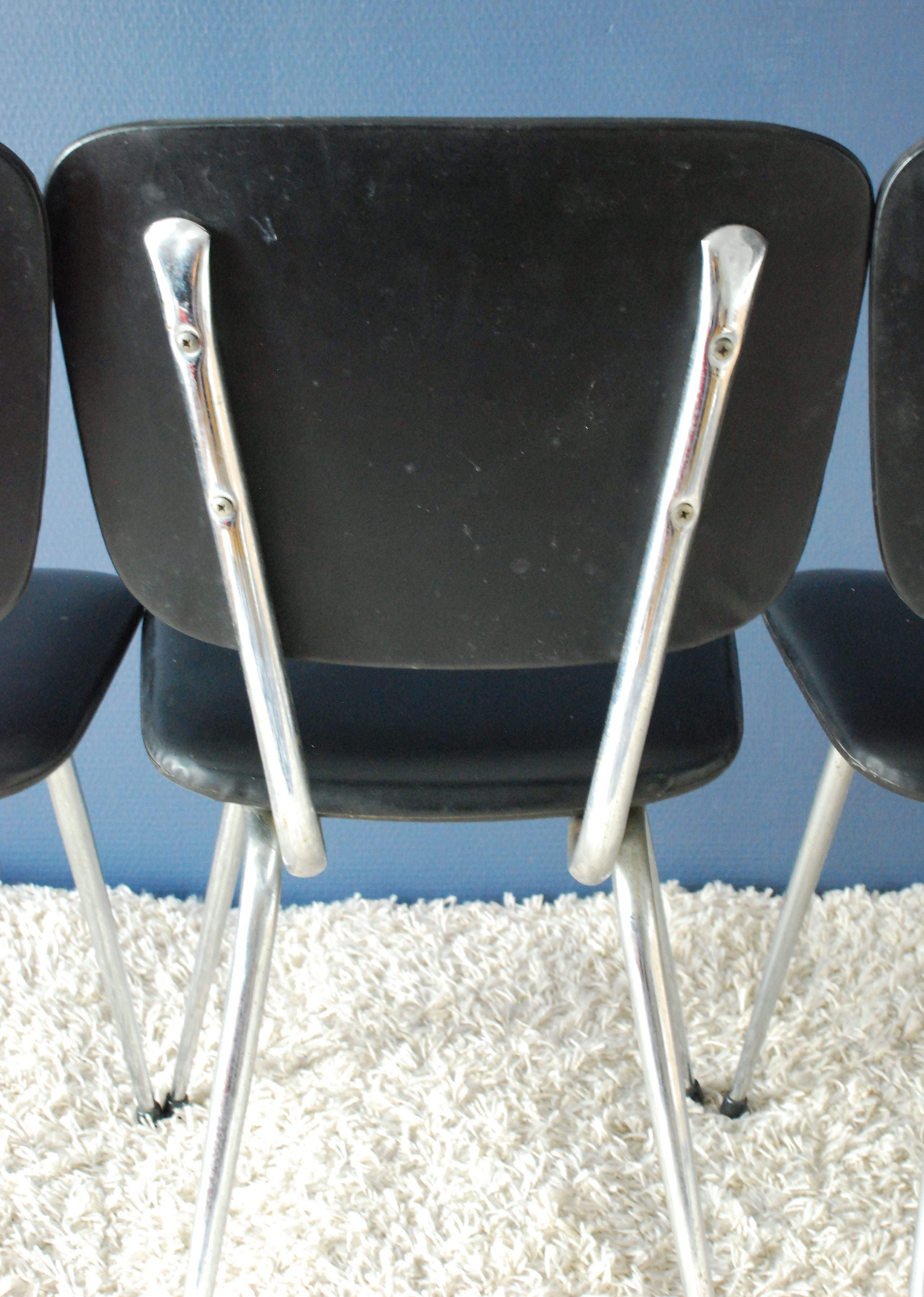 Set of three chairs in black leatherette