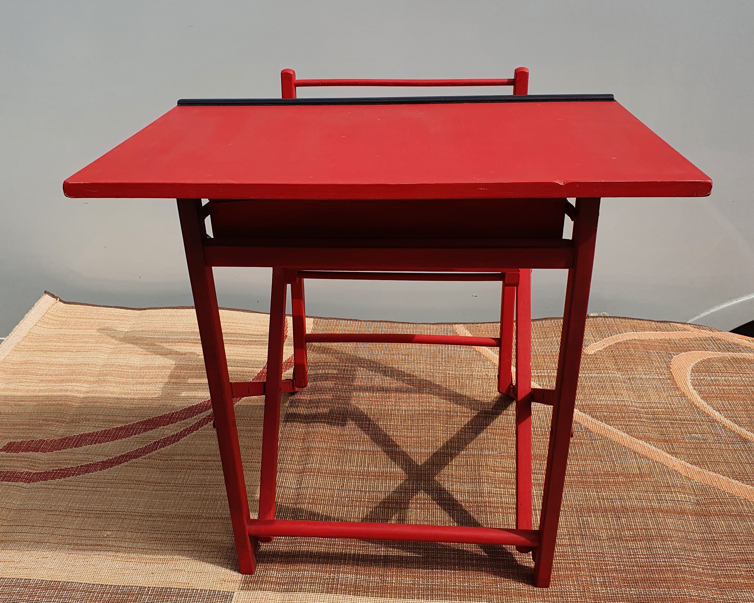 Folding children's desk made of painted wood