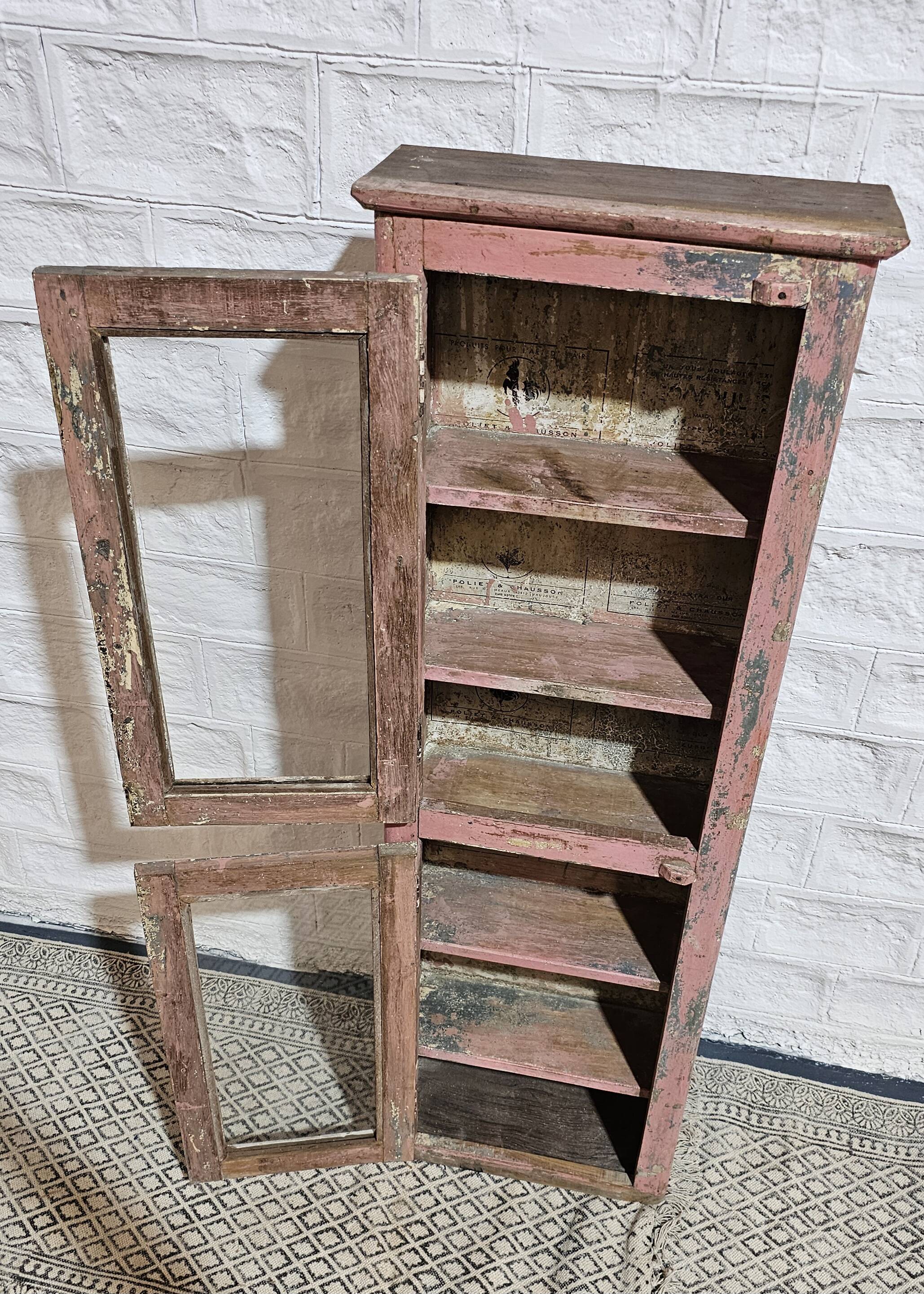 Pink showcase in Burmese teak