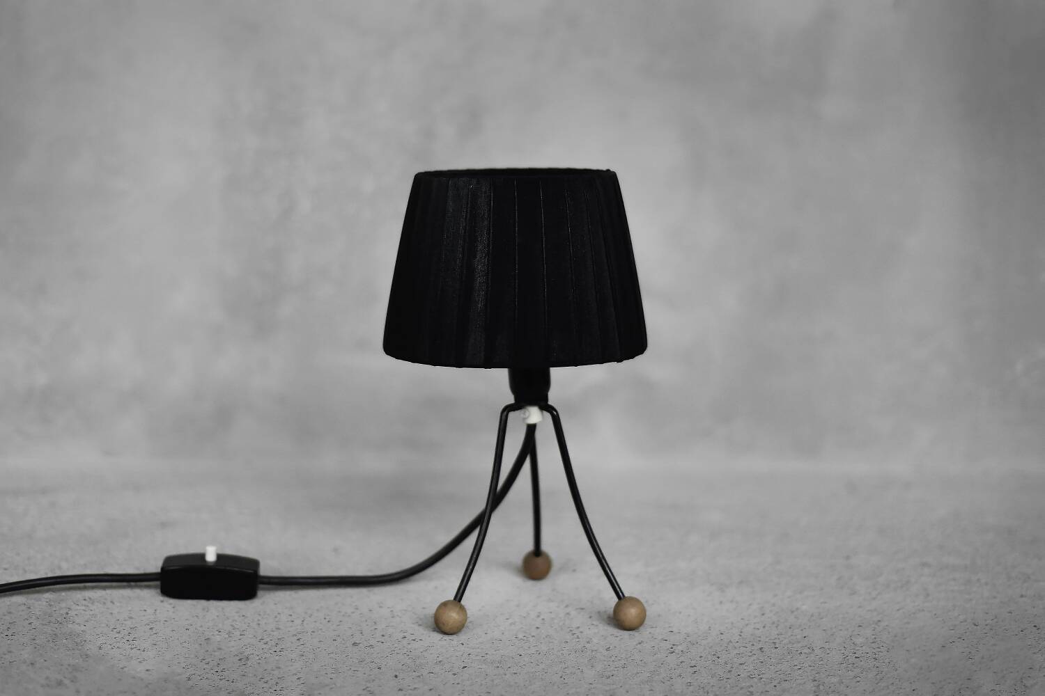 Small modern Polish table lamp from the mid-century with a black shade, 1960s.