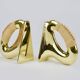 Pair of Carl Auböck Flat Iron bookends in brass and rattan #3530, Vienna, Austria