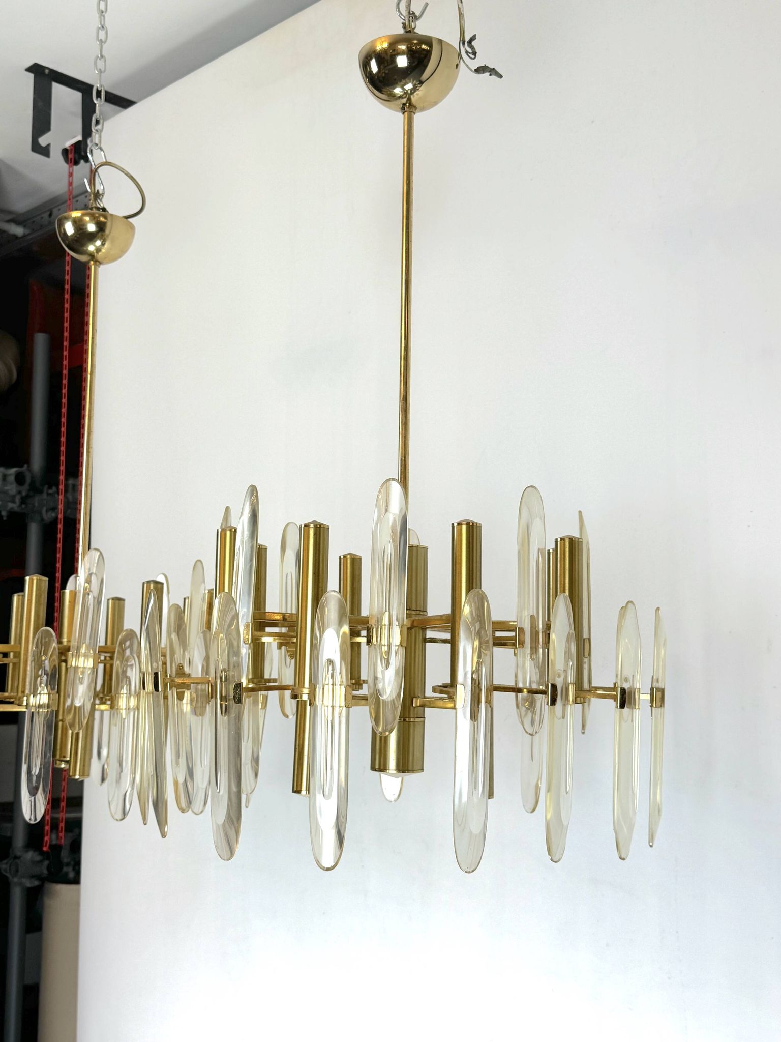 Sciolari, pair of Italian brass and glass chandeliers from 70s