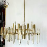 Sciolari, pair of Italian brass and glass chandeliers from 70s