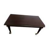 Lacquered coffee table with vintage wheels 70s