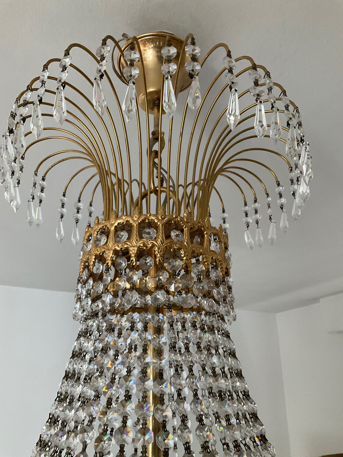 Brass chandelier and crystal tassel waterfall