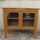 Art Deco sideboard in wood, with 2 glass doors.