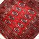 Tapis vintage fait main Tekke en laine rouge (109cm x 112cm) – Années 1970