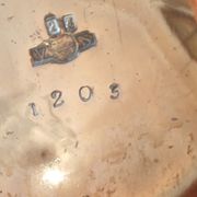 Ancient samovar tea fountain in silver metal