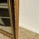 Gilded mirror with frieze h2m10 l:73cm