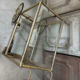 Vintage gold bar cart serving trolley