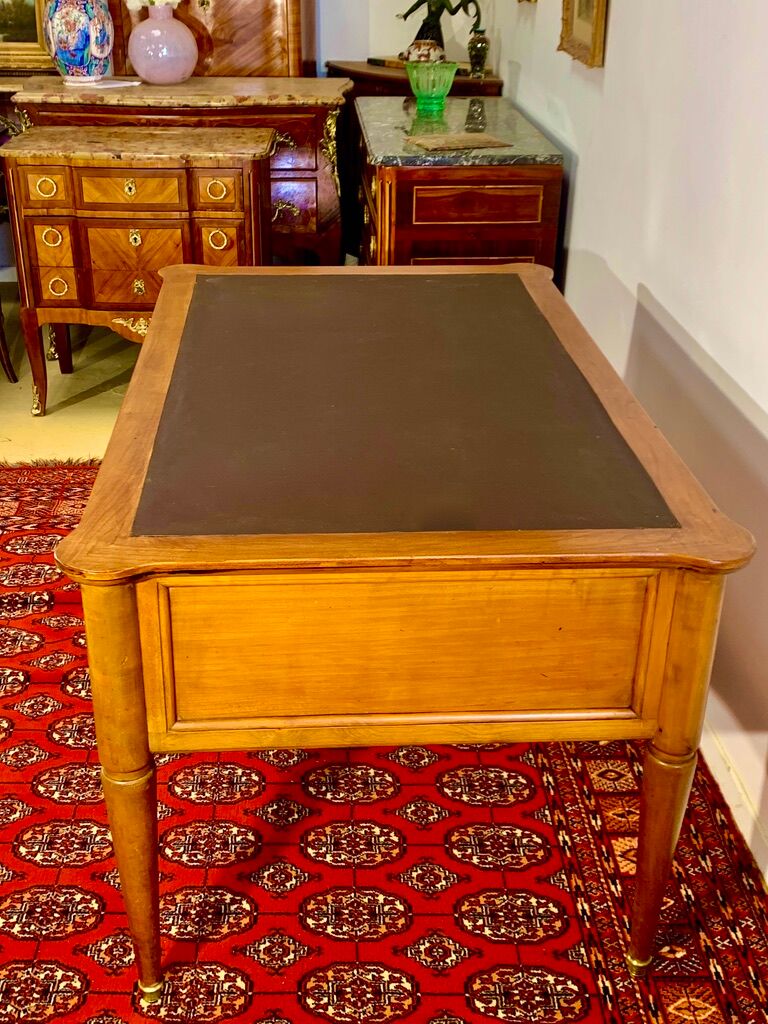 Louis XVI desk in cherry wood and gilded bronzes