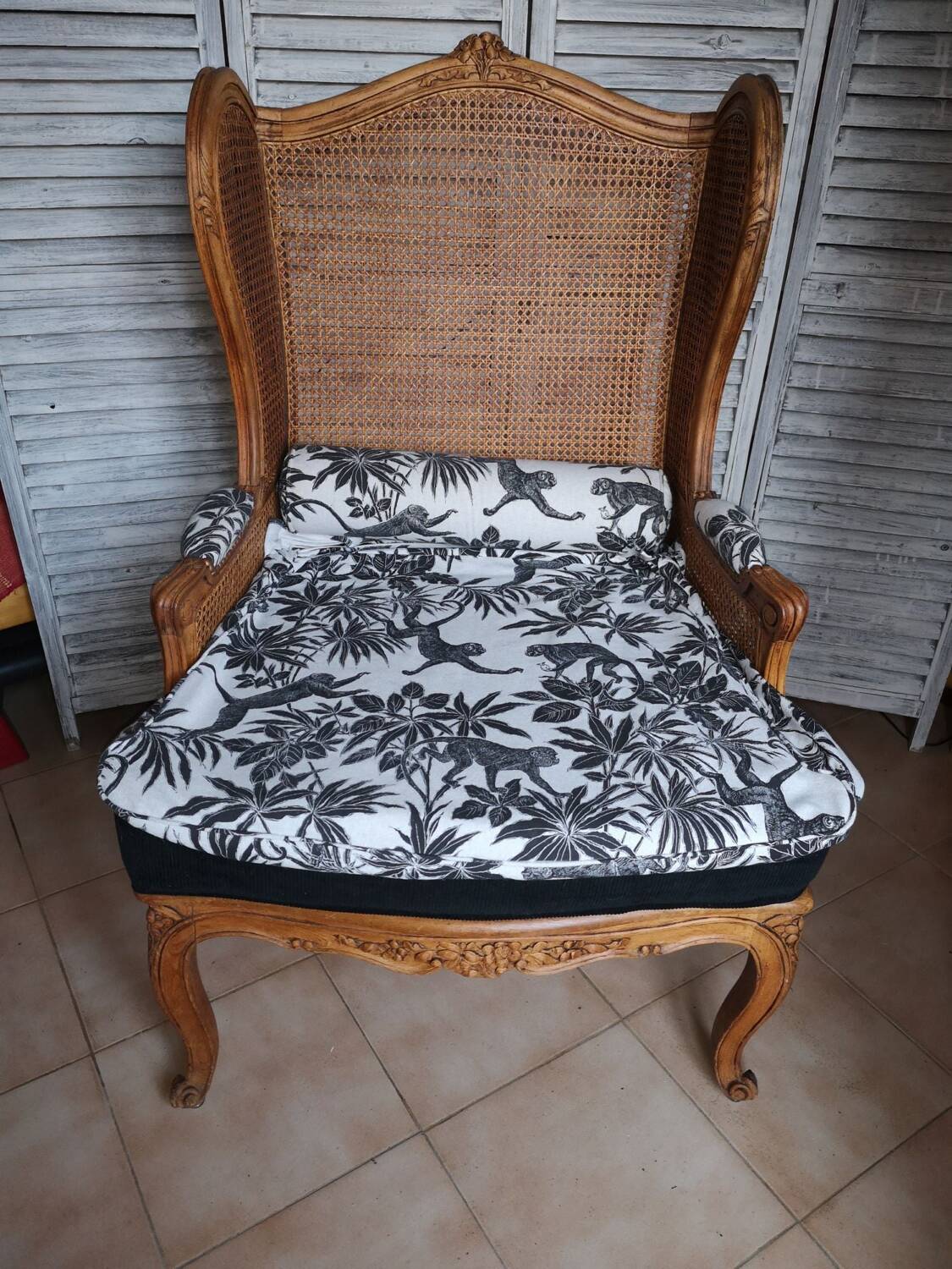Antique wingback armchair