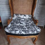 Antique wingback armchair