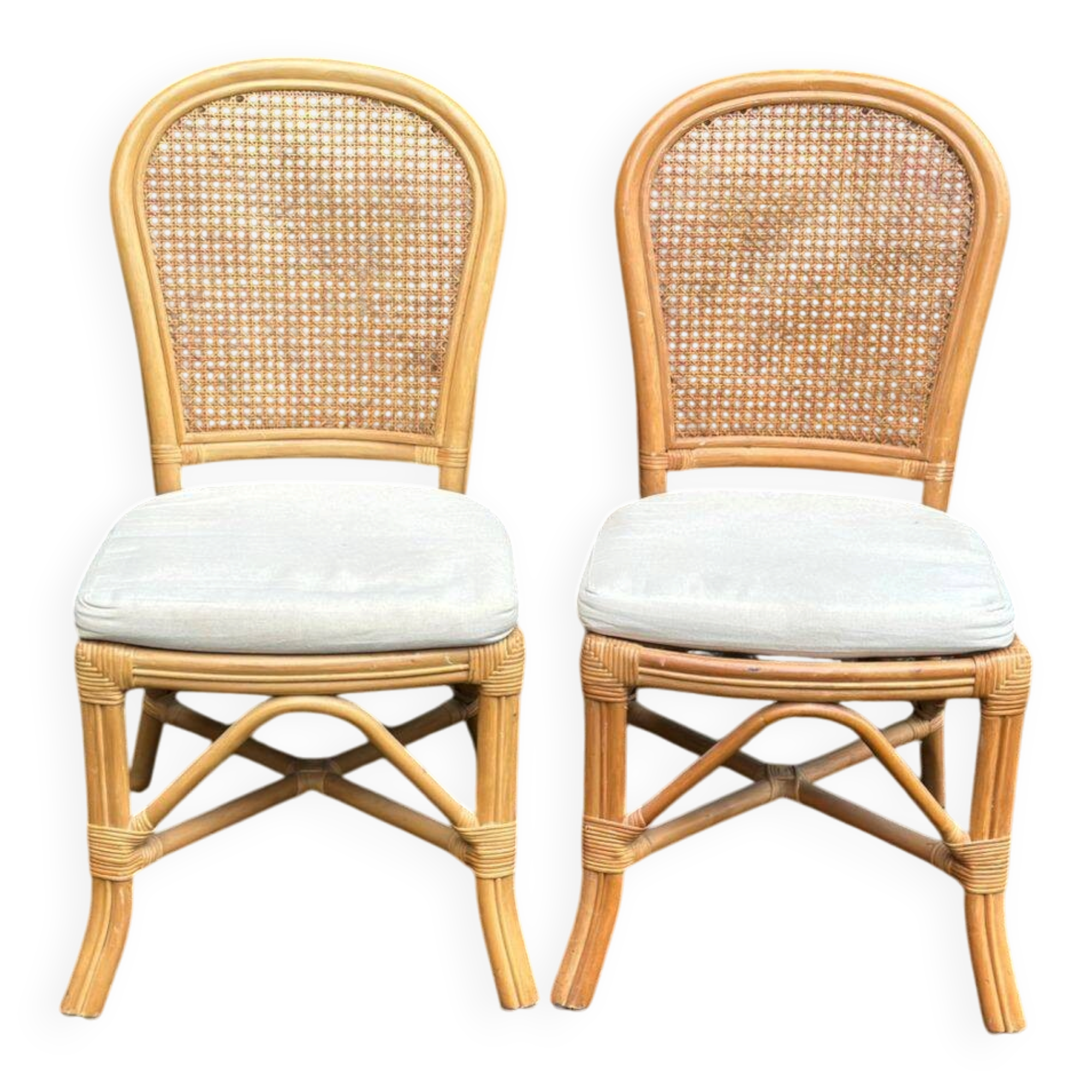 2 rattan and caned chairs in colonial bistro style from the 1990s.