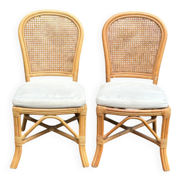 2 rattan and caned chairs in colonial bistro style from the 1990s.