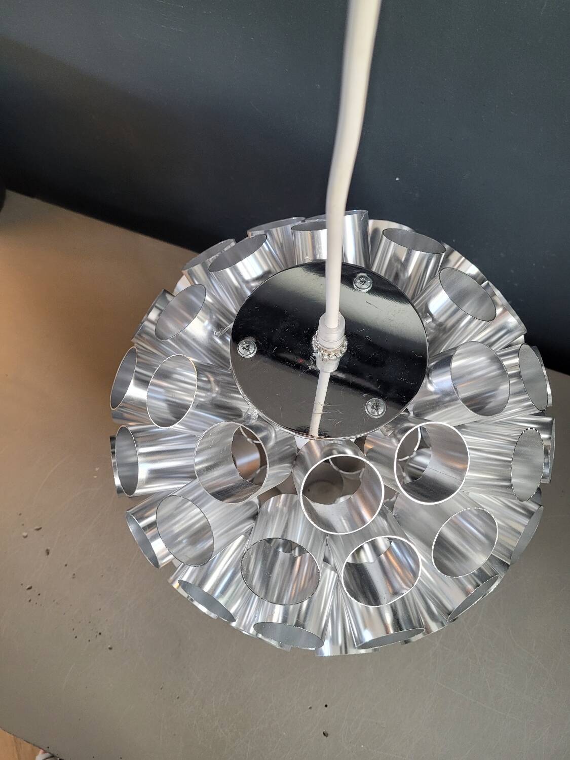 Space-age aluminum pendant light