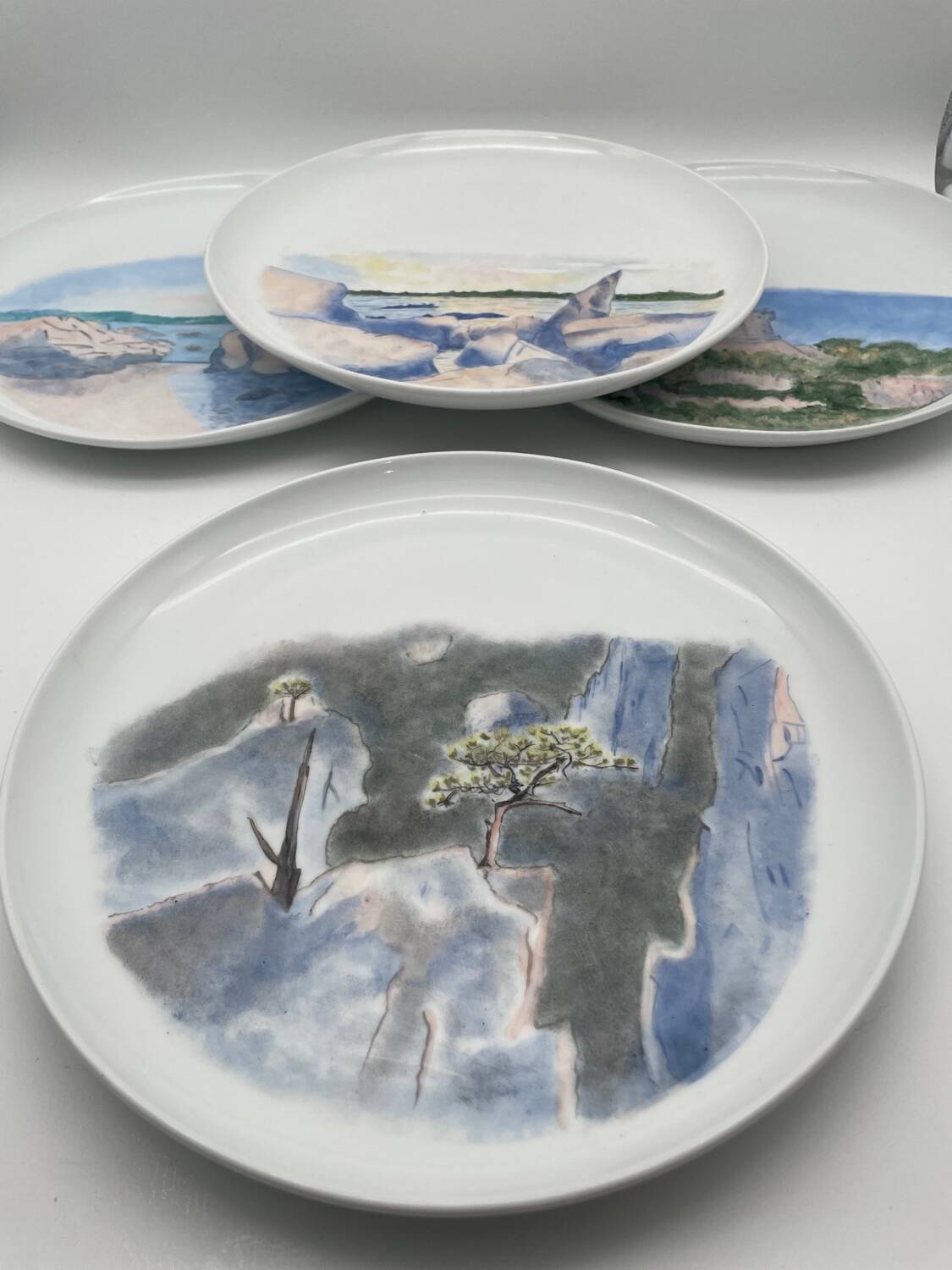 Hand painted porcelain plate with landscape decoration