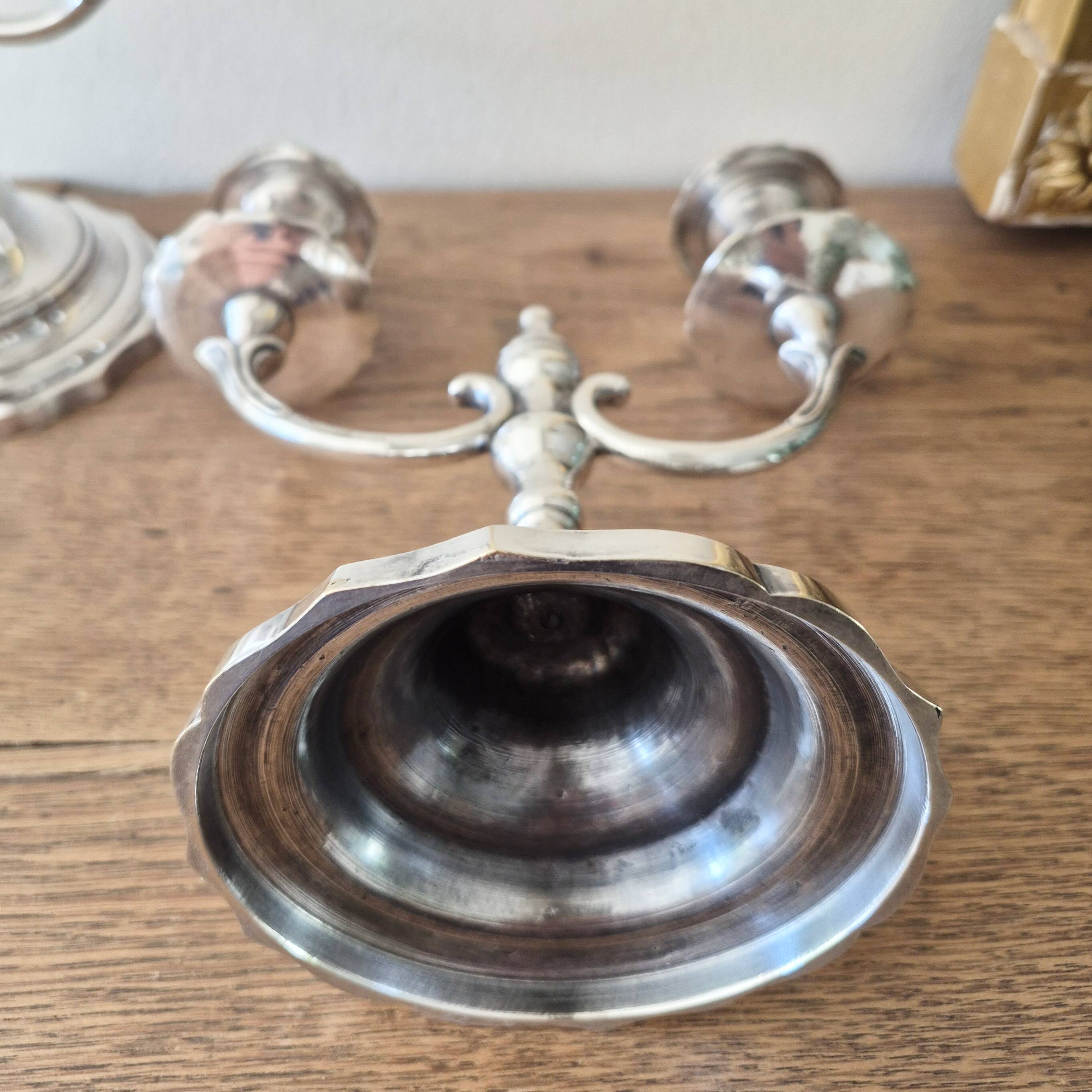 Pair of silver-plated metal candlesticks with 2 branches.