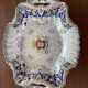 Plat rocaille porcelaine de Rouen