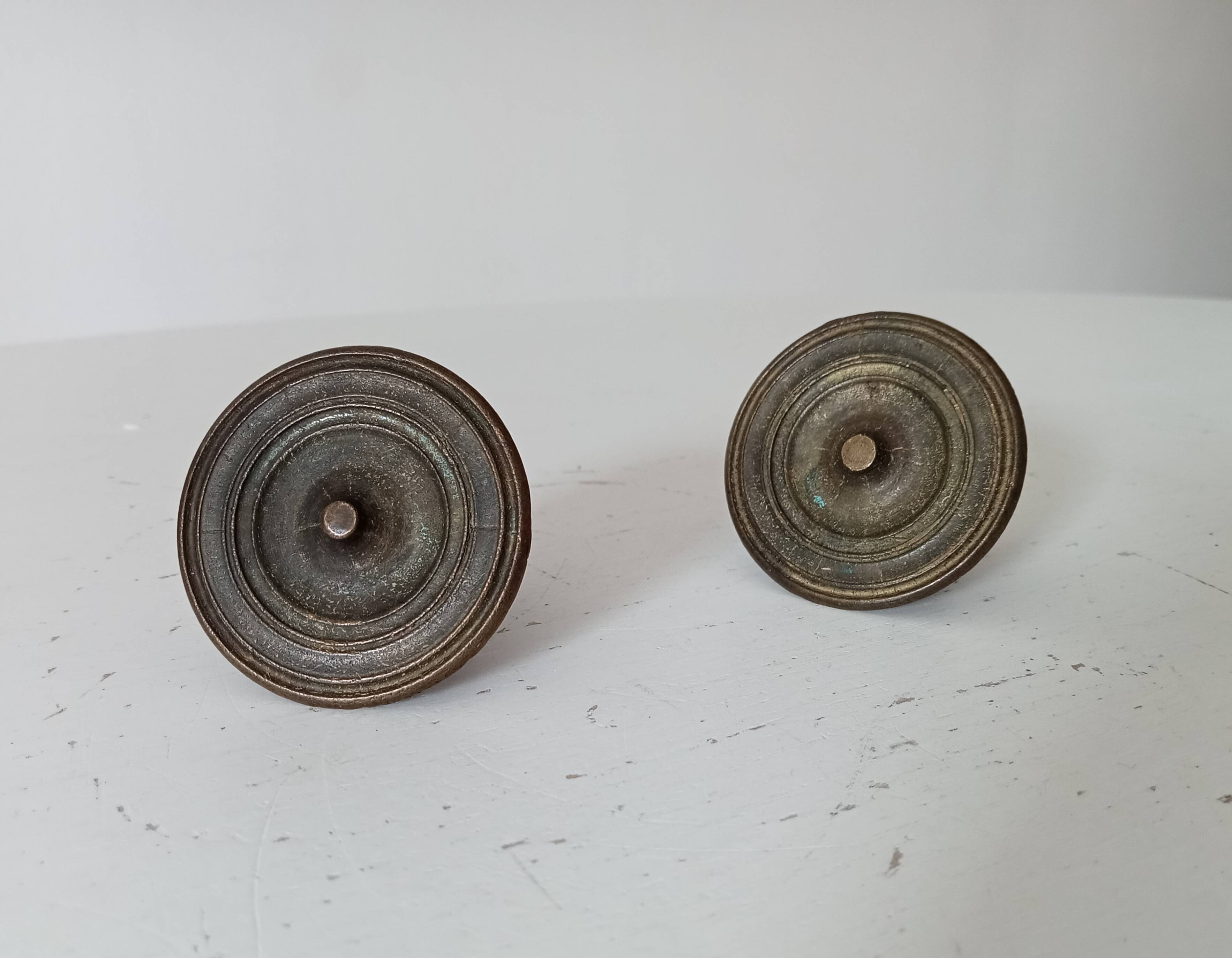 Pair of antique Empire furniture knobs from the 19th century.