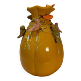 Yellow vase decorated with birds