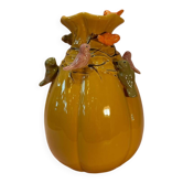 Yellow vase decorated with birds