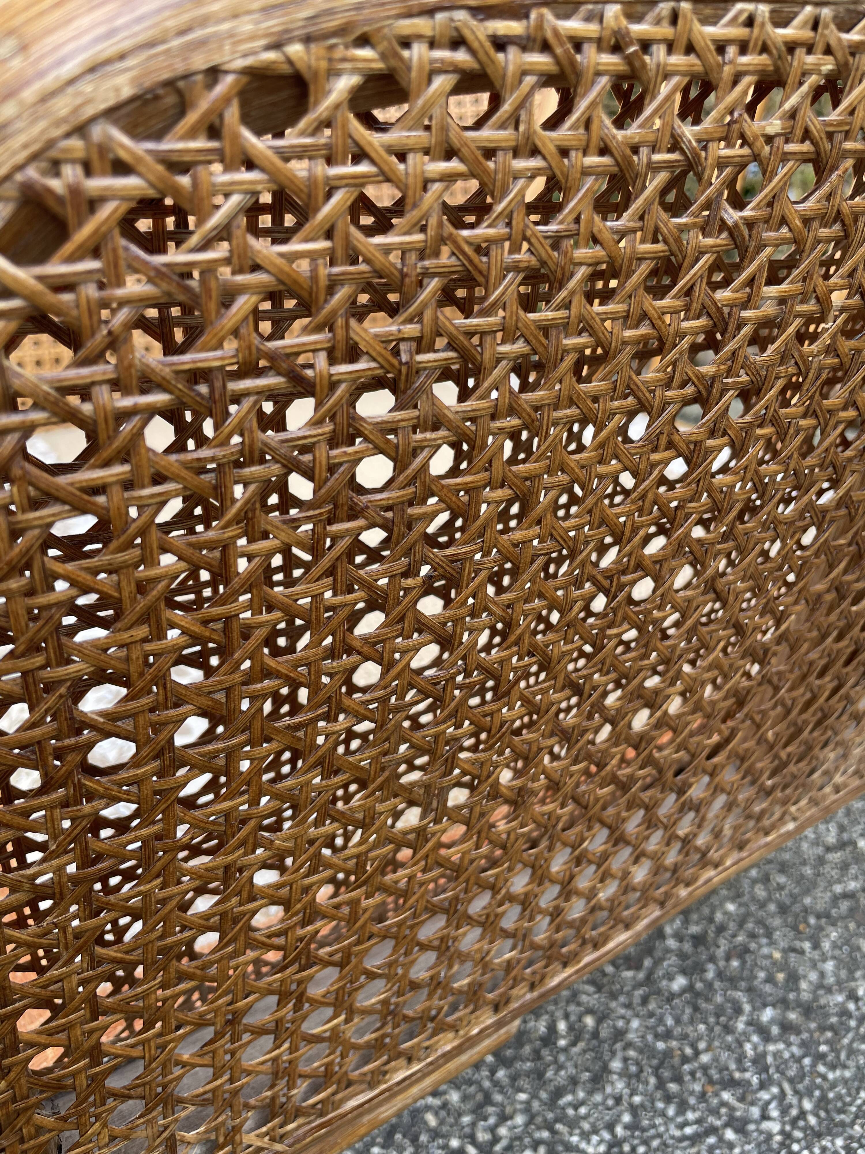 Paire de fauteuils en rotin et cannage