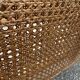 Paire de fauteuils en rotin et cannage