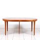 Round dining table in teak by Ib Kofod Larsen for Faarup Mobelfabrik