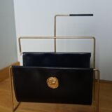 Modernist magazine rack in the style of Jacques Adnet