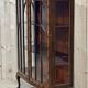 English Chippendale walnut display cabinet from the 1930s