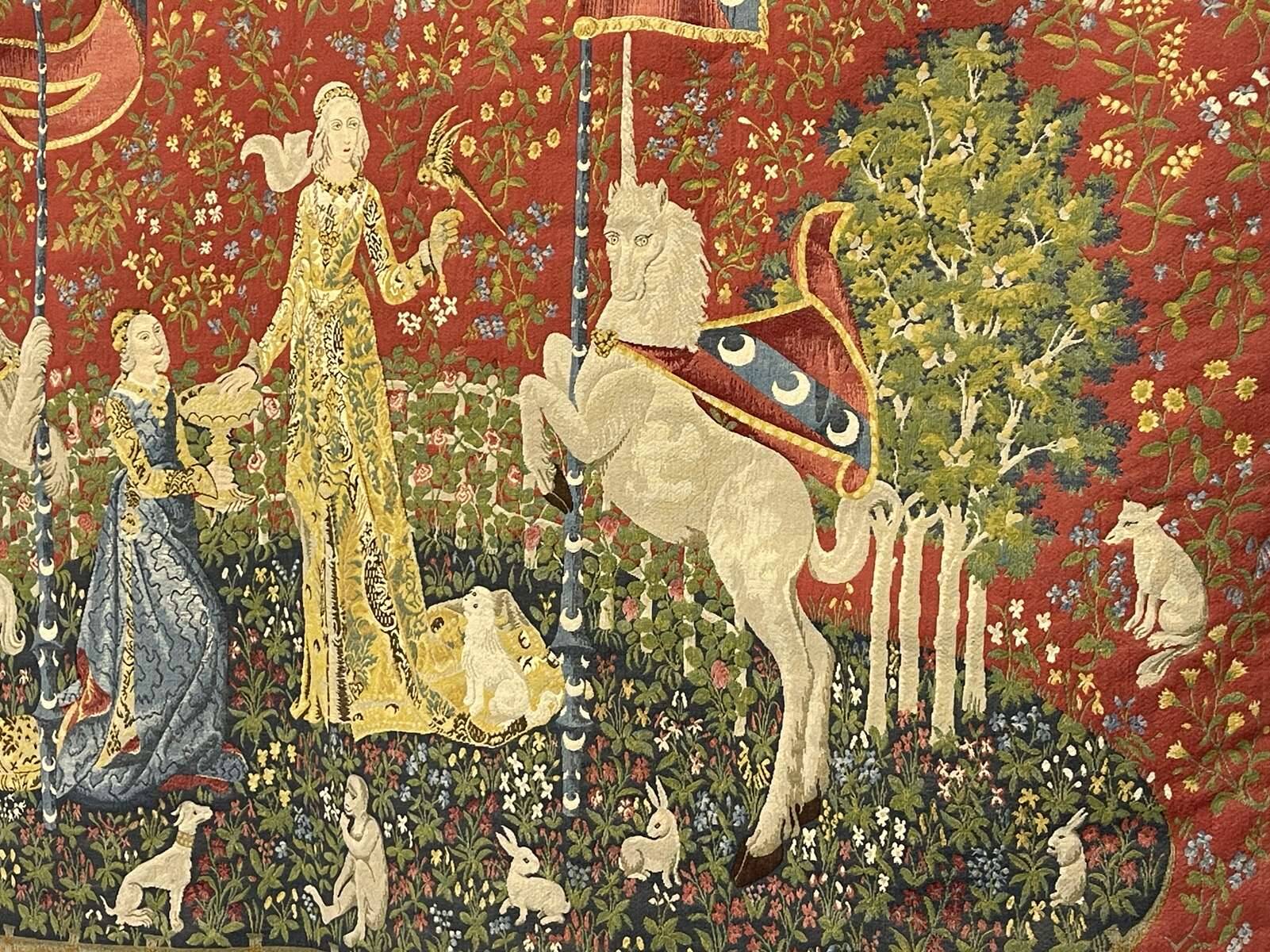 Medieval-style handmade tapestry, named Lady with the Unicorn.