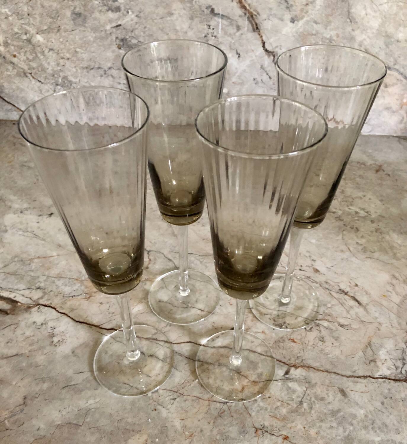 Smoked glass champagne flutes