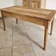 Old farmhouse table made of solid walnut wood.
