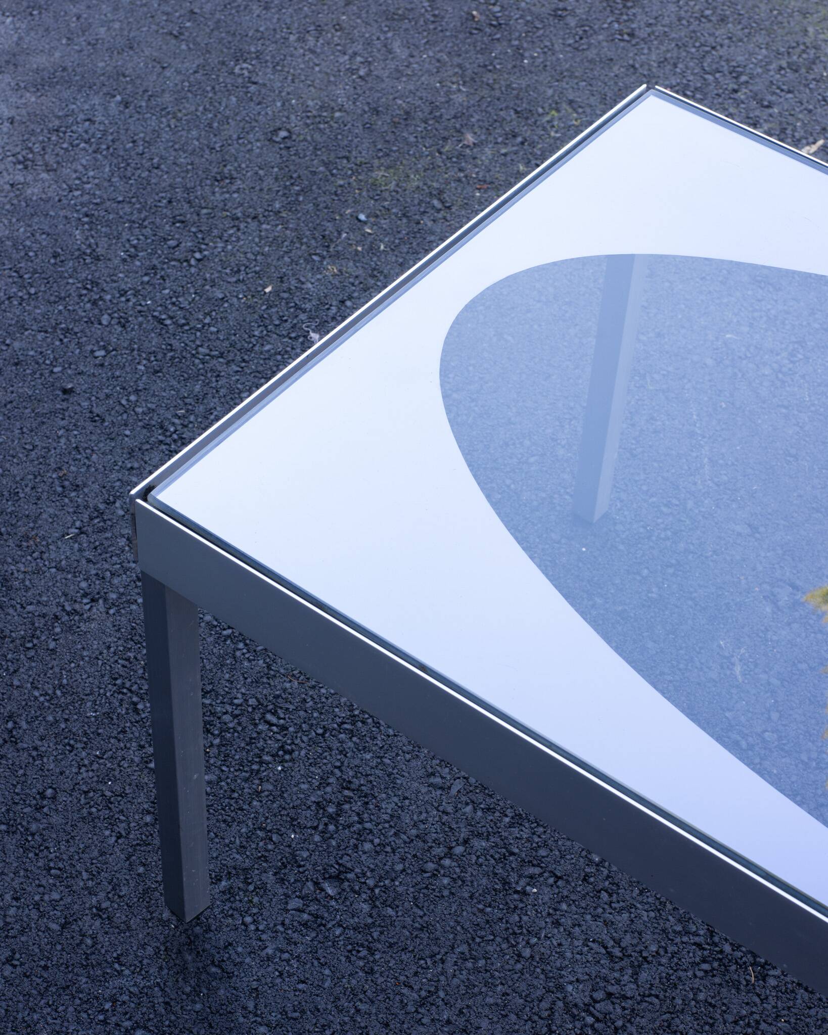 Glass coffee table with brushed aluminum legs, 1970