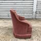 Fauteuil crapaud rose capitonné